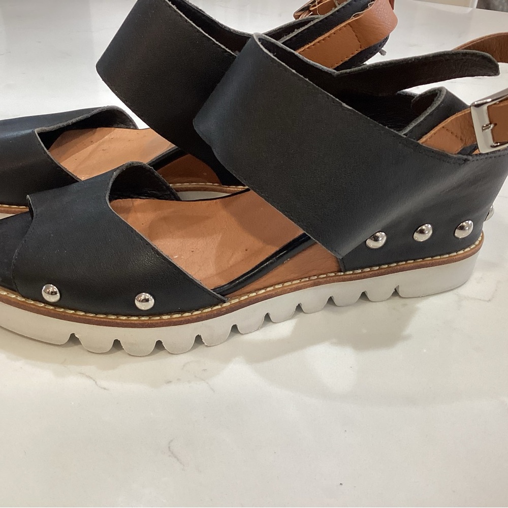 Elegant Black and Tan Sandals with Stud Accents